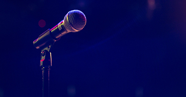 Microphone on field of purple