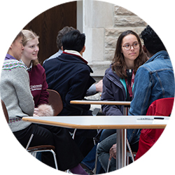 Students around table in Astronomy Building